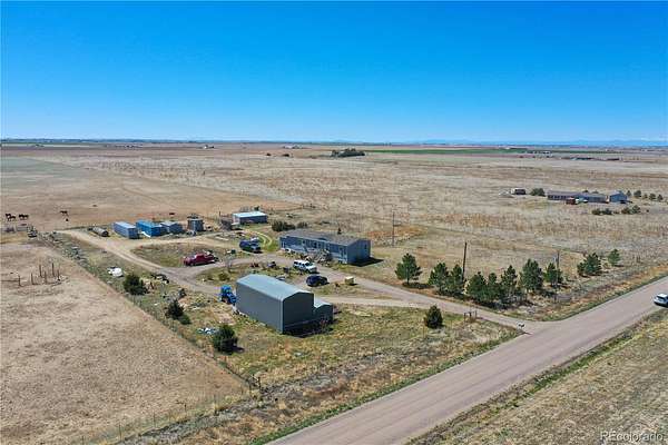 38.6 Acres of Agricultural Land with Home for Sale in Bennett, Colorado