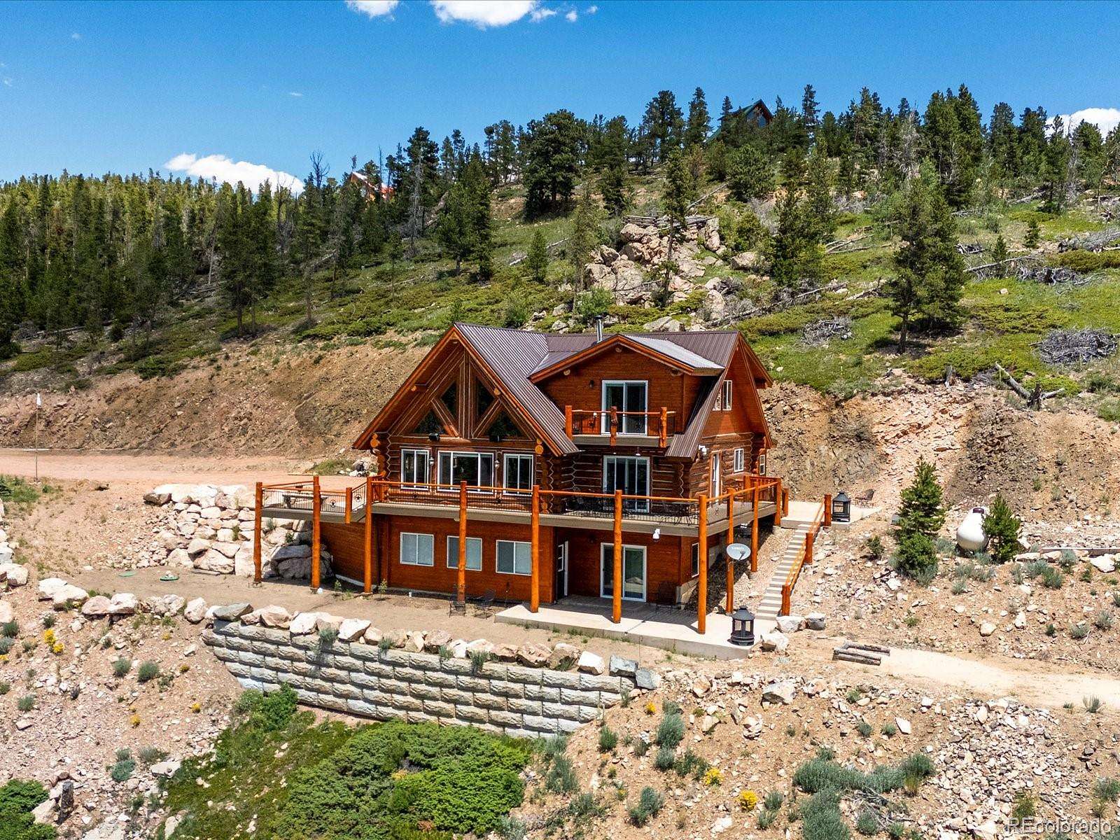 23.3 Acres of Recreational Land with Home for Sale in Red Feather Lakes, Colorado