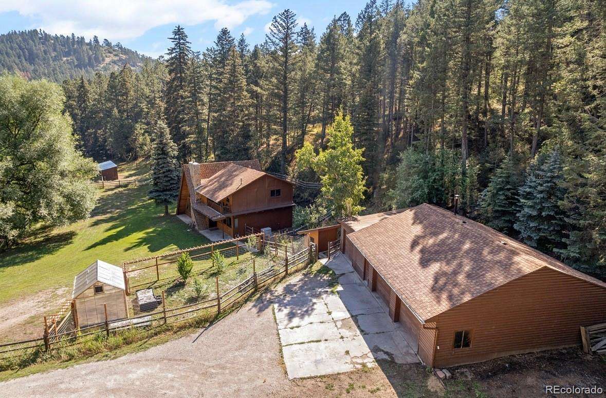 1.86 Acres of Land with Home for Sale in Indian Hills, Colorado