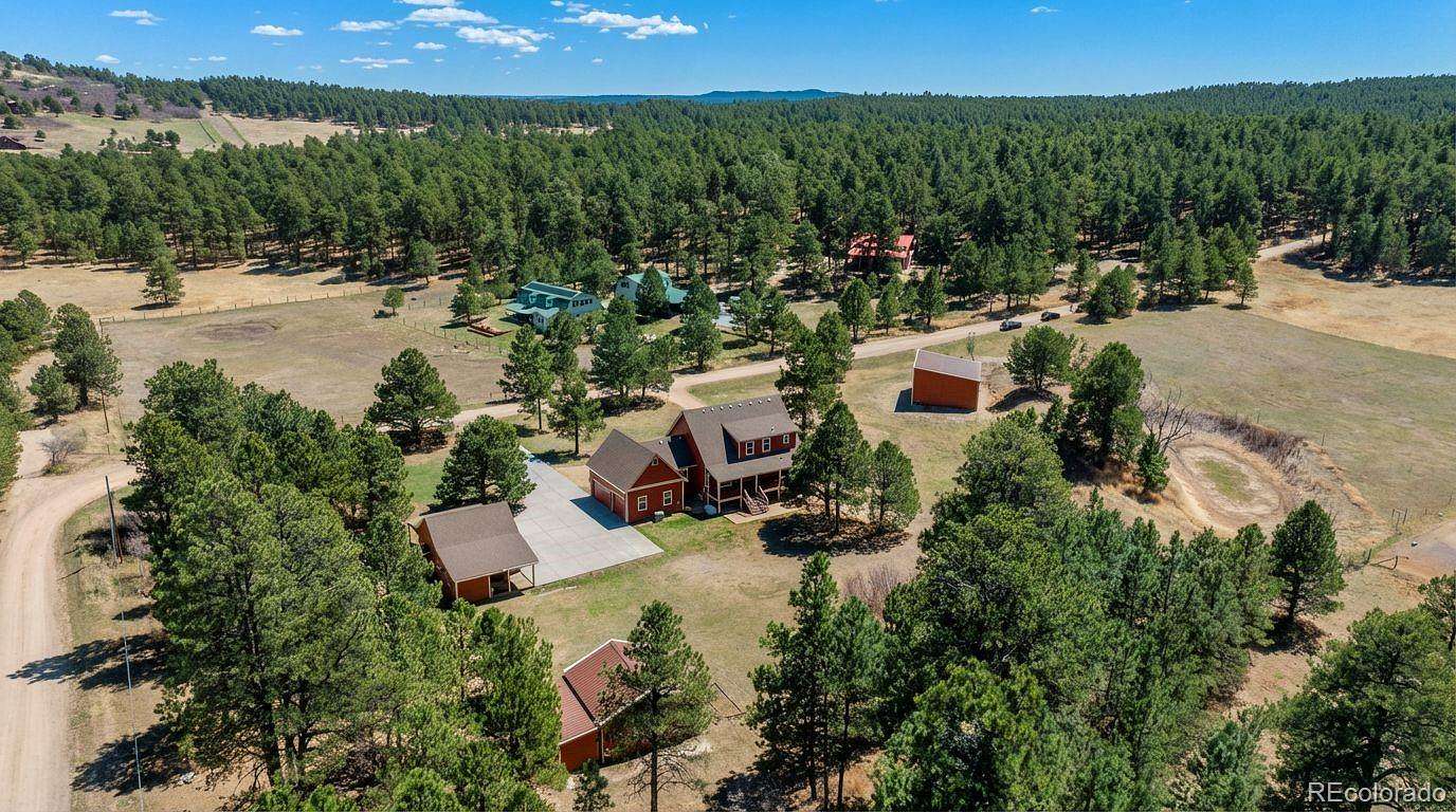 5 Acres of Land with Home for Sale in Larkspur, Colorado