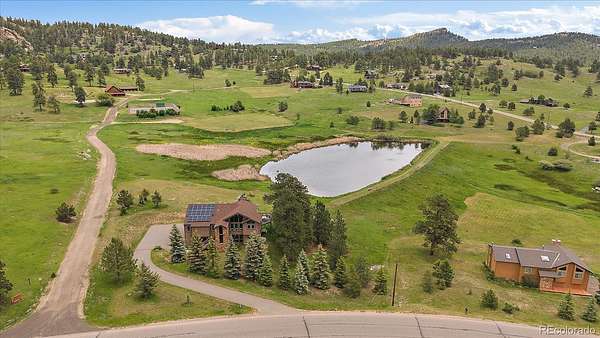 2 Acres of Land with Home for Sale in Evergreen, Colorado