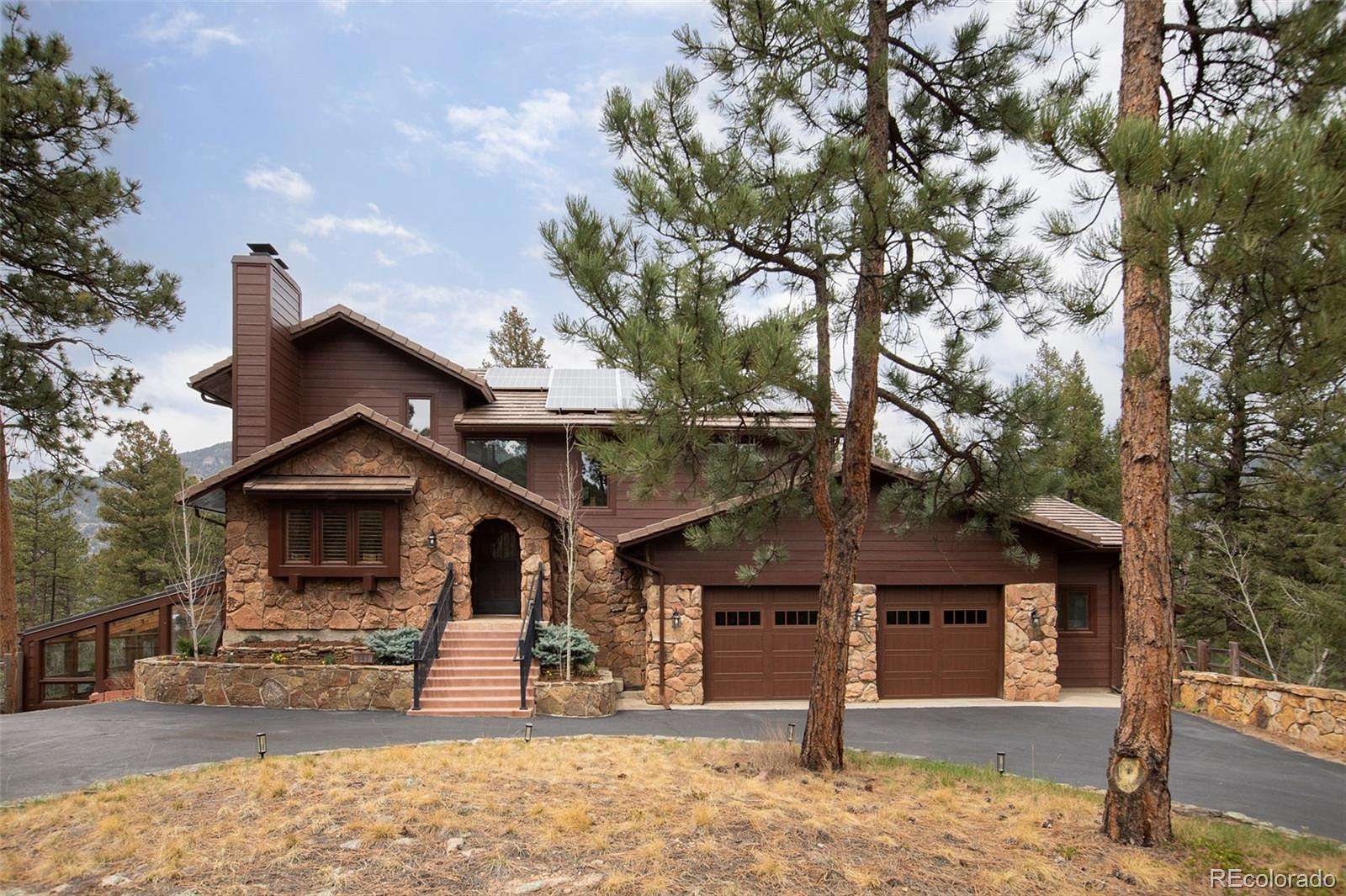 4.5 Acres of Land with Home for Sale in Evergreen, Colorado