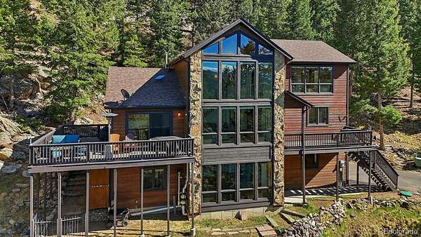 1.65 Acres of Land with Home for Sale in Evergreen, Colorado