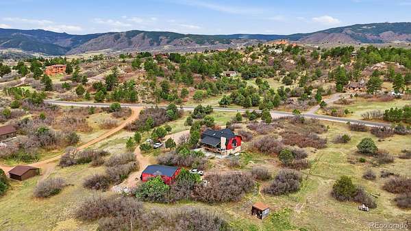 5 Acres of Land with Home for Sale in Sedalia, Colorado