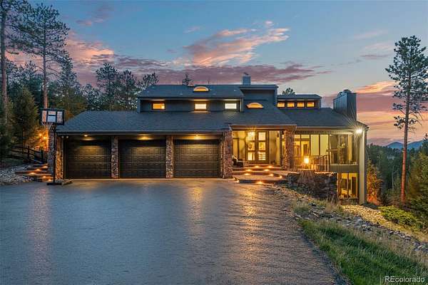 5 Acres of Land with Home for Sale in Evergreen, Colorado