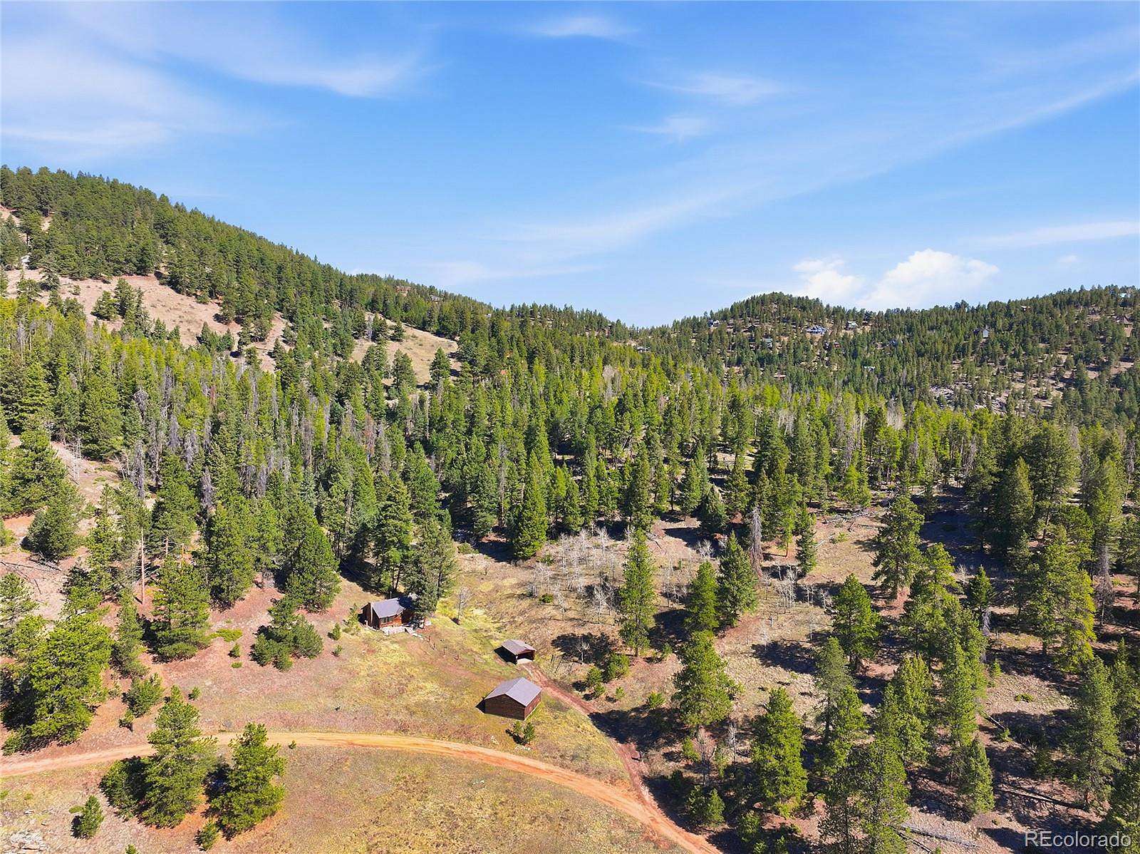 32.5 Acres of Recreational Land with Home for Sale in Evergreen, Colorado