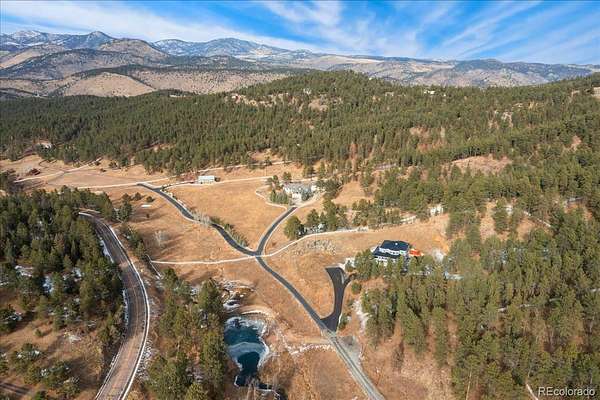 10.1 Acres of Recreational Land with Home for Sale in Evergreen, Colorado