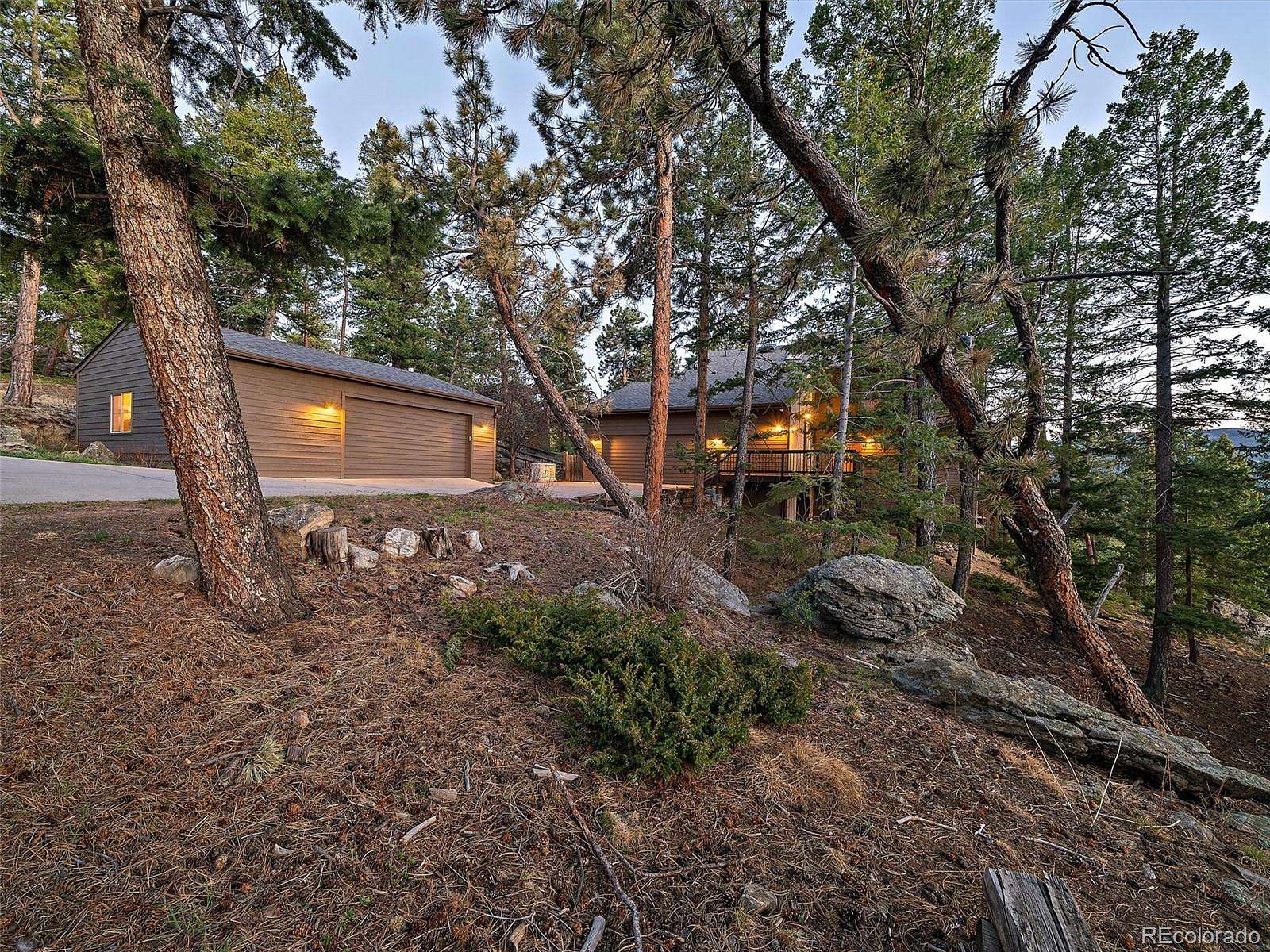 4.69 Acres of Land with Home for Sale in Evergreen, Colorado