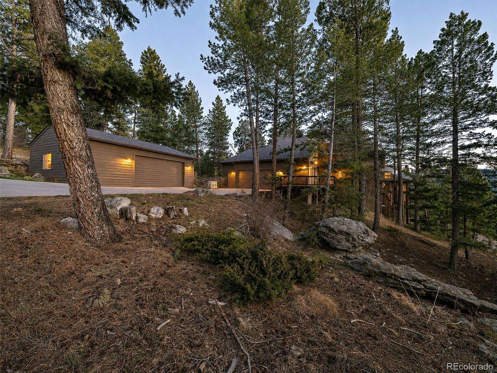 4.69 Acres of Land with Home for Sale in Evergreen, Colorado
