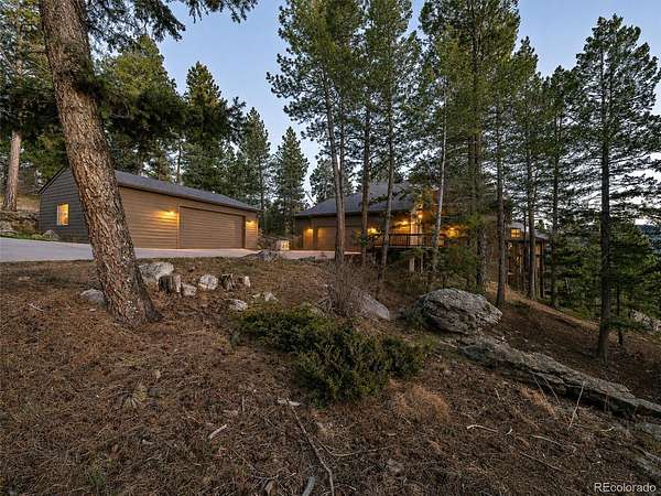 4.69 Acres of Land with Home for Sale in Evergreen, Colorado