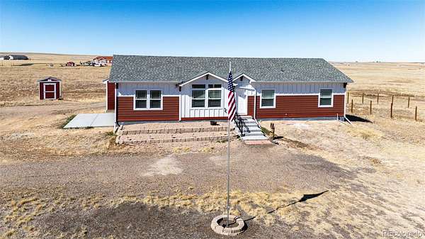 37.7 Acres of Agricultural Land with Home for Sale in Strasburg, Colorado
