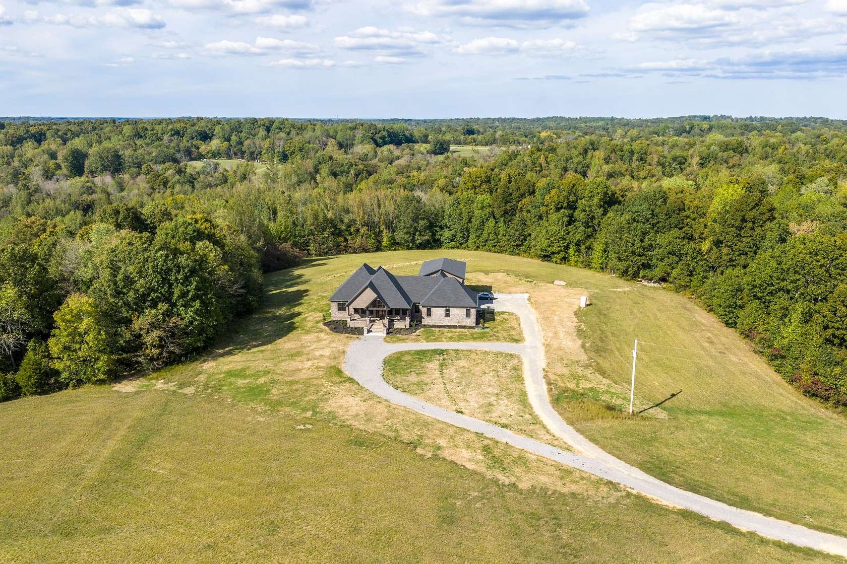 40.9 Acres of Recreational Land with Home for Sale in Palmyra, Tennessee