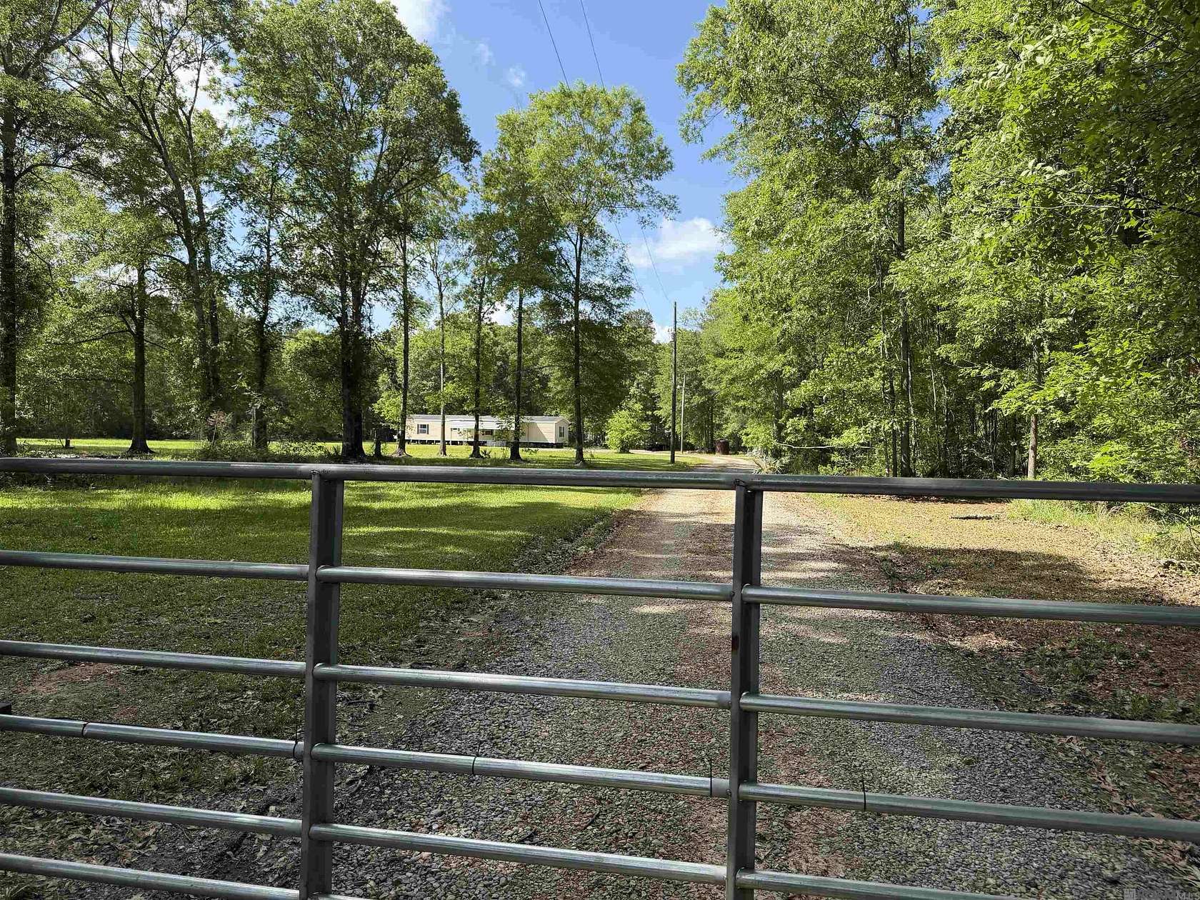 15.7 Acres of Land with Home for Sale in Livingston, Louisiana