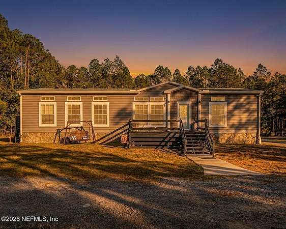 5.2 Acres of Land with Home for Sale in Sanderson, Florida