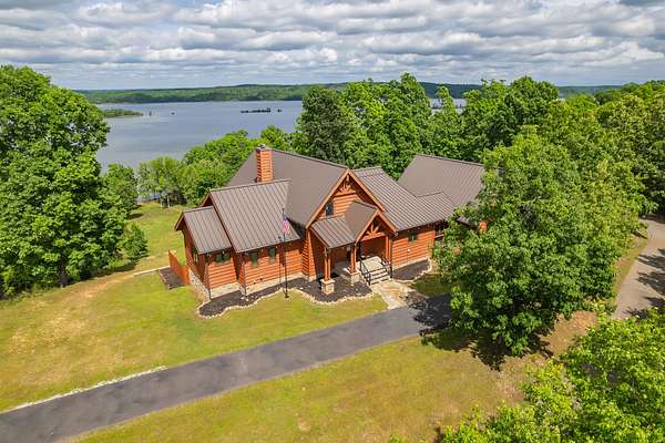 3.47 Acres of Land with Home for Sale in Big Sandy, Tennessee