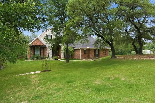 5 Acres of Land with Home for Sale in Reno, Texas