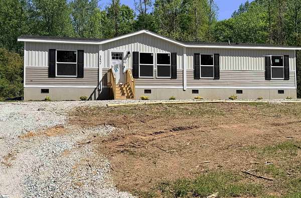 2.3 Acres of Land with Home for Sale in Waterloo, South Carolina