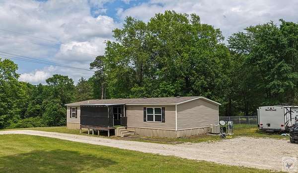 4.12 Acres of Land with Home for Sale in New Boston, Texas