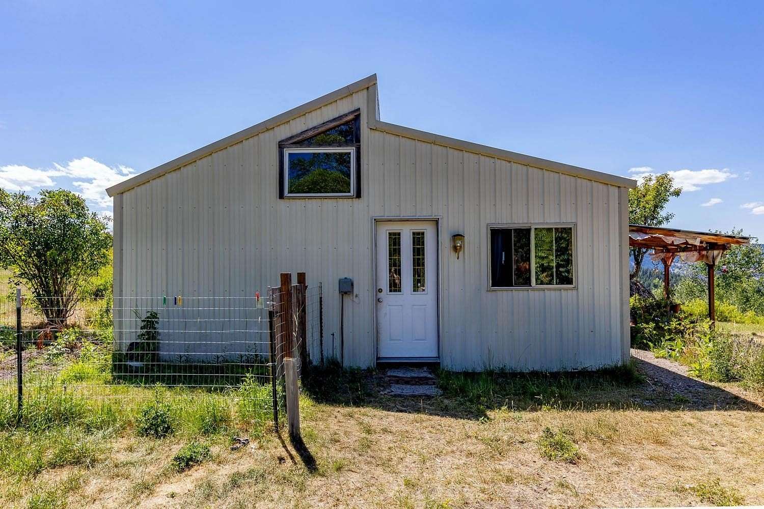 27.8 Acres of Recreational Land with Home for Sale in Curlew, Washington