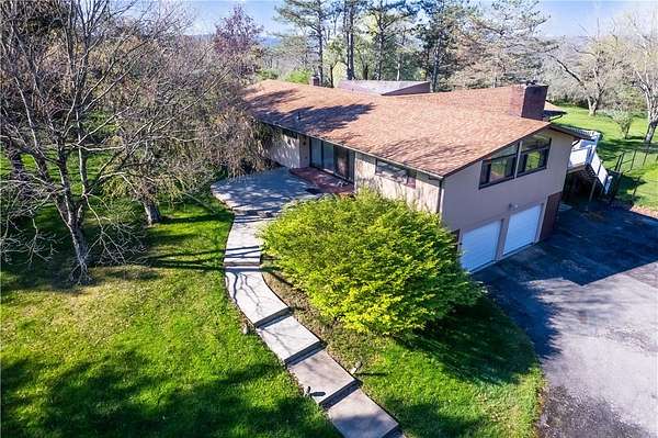 7.9 Acres of Land with Home for Sale in Sayre, Pennsylvania