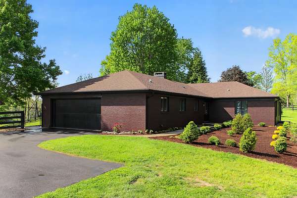 14.3 Acres of Land with Home for Sale in Nicholasville, Kentucky