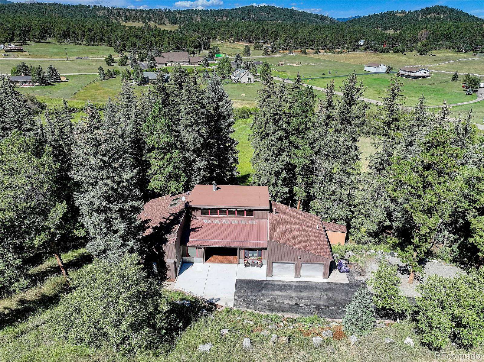 2 Acres of Land with Home for Sale in Evergreen, Colorado