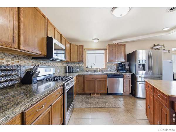 9.5 Acres of Land with Home for Sale in La Salle, Colorado