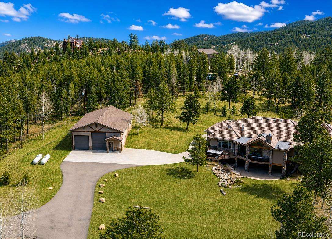 4.35 Acres of Land with Home for Sale in Evergreen, Colorado