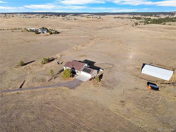 40 Acres of Agricultural Land with Home for Sale in Elizabeth, Colorado
