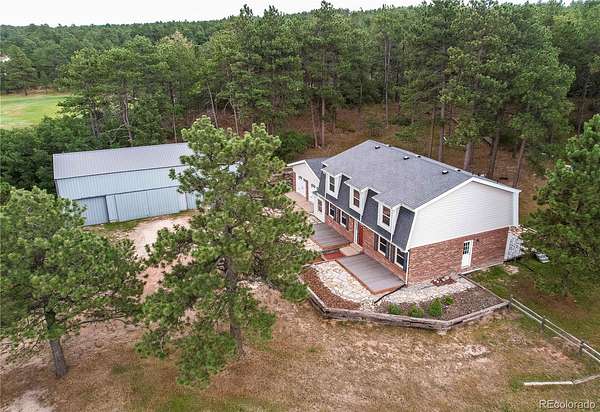 5 Acres of Land with Home for Sale in Larkspur, Colorado