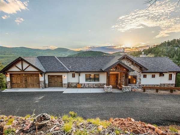 1.65 Acres of Land with Home for Sale in Evergreen, Colorado