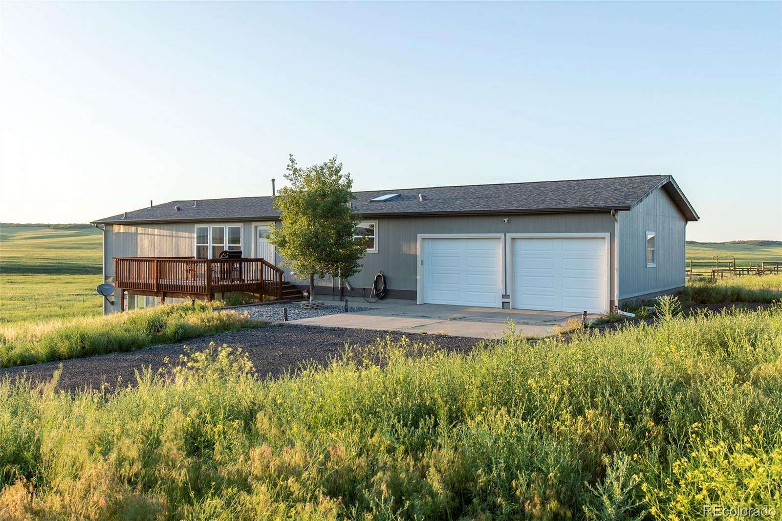 35 Acres of Land with Home for Sale in Larkspur, Colorado