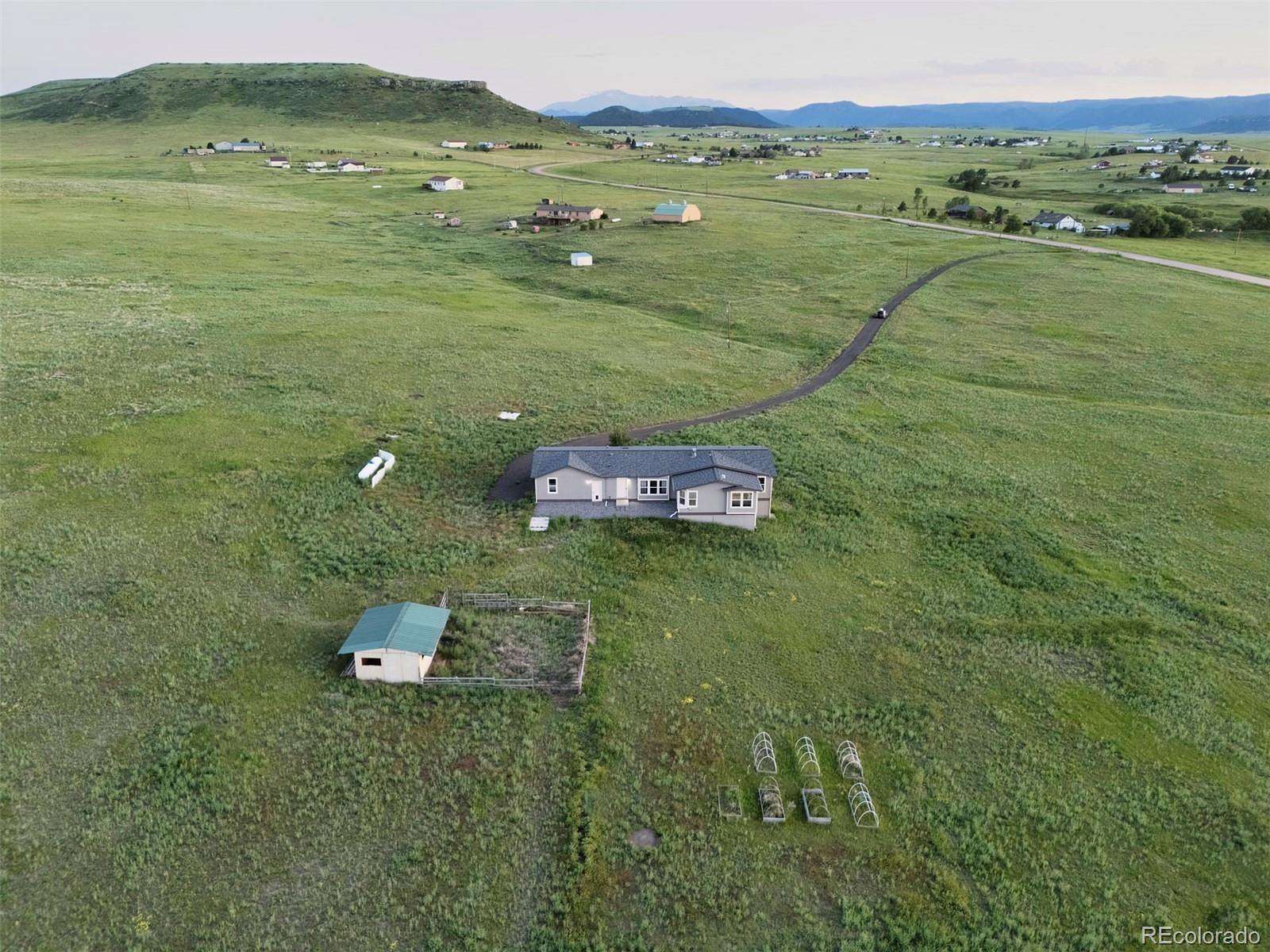 35 Acres of Land with Home for Sale in Larkspur, Colorado
