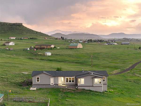 35 Acres of Land with Home for Sale in Larkspur, Colorado