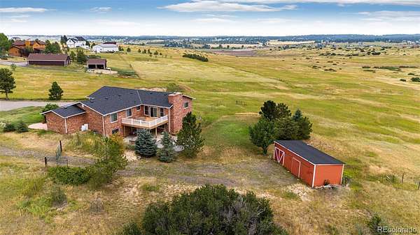 5 Acres of Land with Home for Sale in Franktown, Colorado