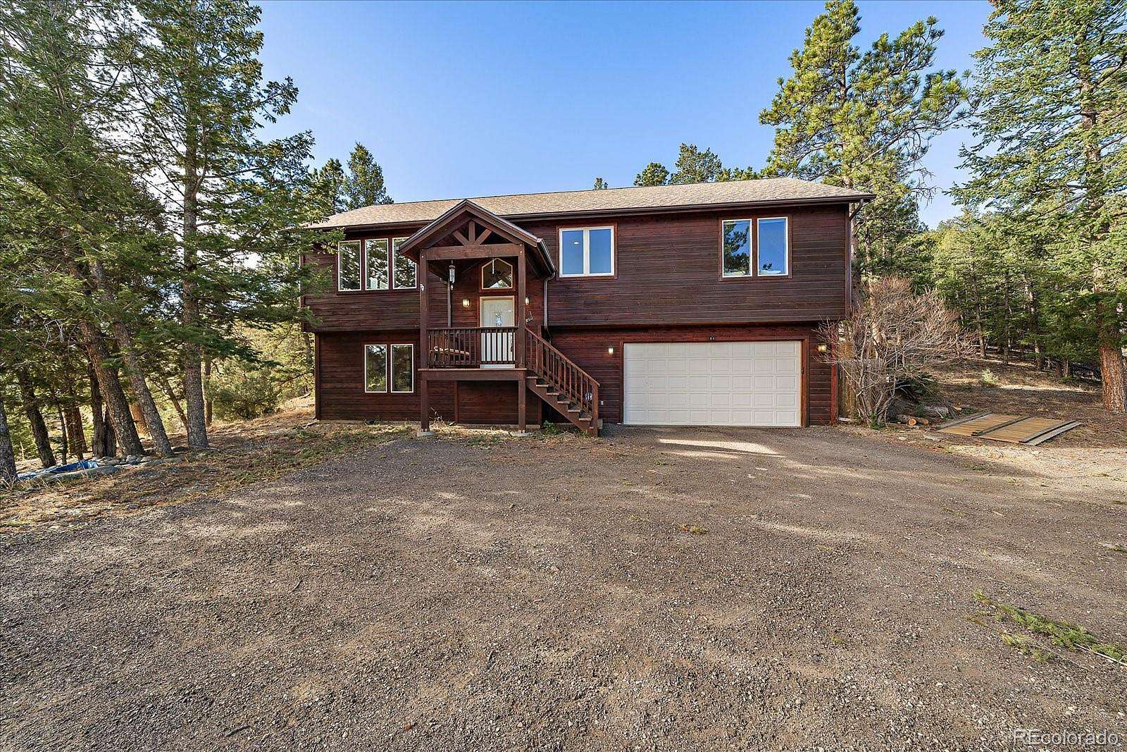 2 Acres of Land with Home for Sale in Evergreen, Colorado