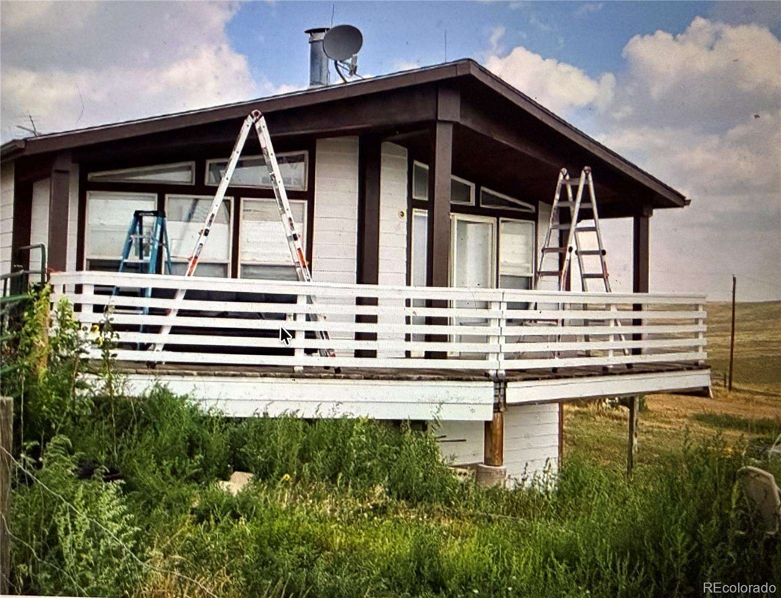 60 Acres of Agricultural Land with Home for Sale in Elizabeth, Colorado