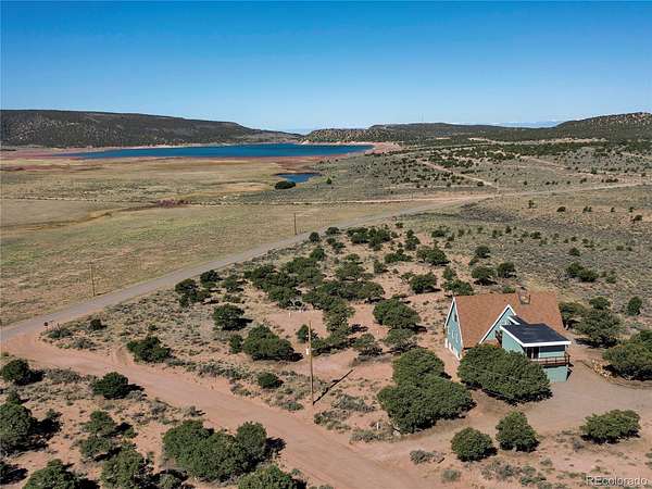 5 Acres of Land with Home for Sale in Fort Garland, Colorado