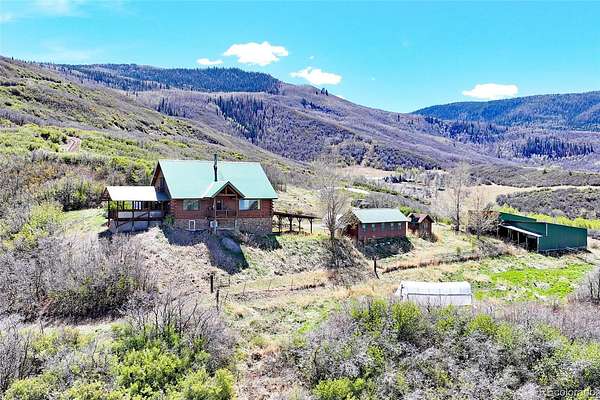 30 Acres of Land with Home for Sale in Collbran, Colorado