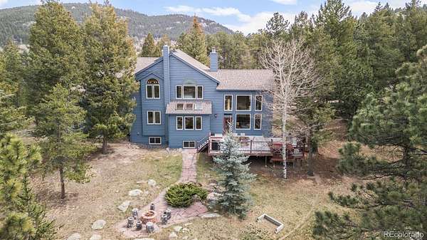 3 Acres of Land with Home for Sale in Evergreen, Colorado