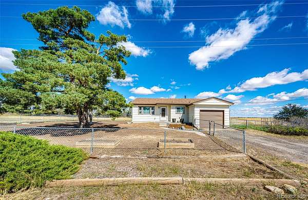 36.7 Acres of Agricultural Land with Home for Sale in Strasburg, Colorado