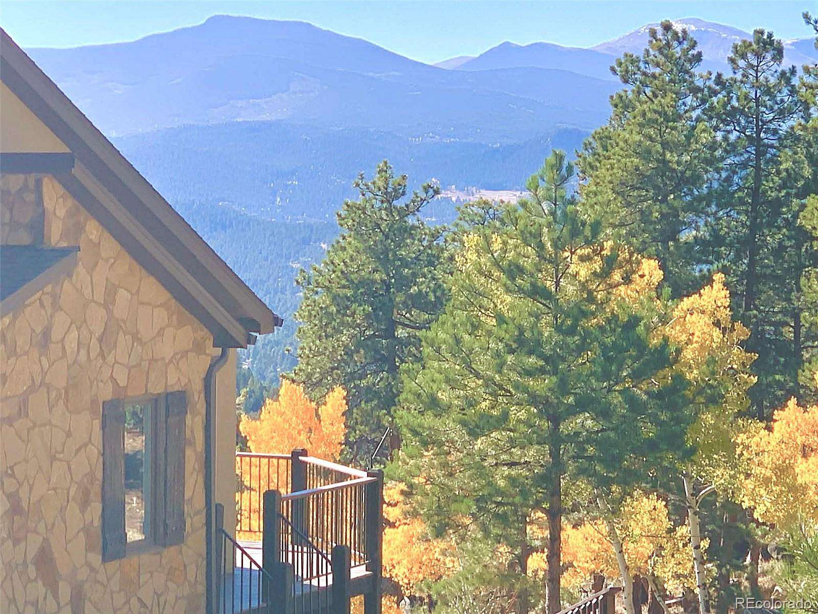 2.69 Acres of Land with Home for Sale in Evergreen, Colorado