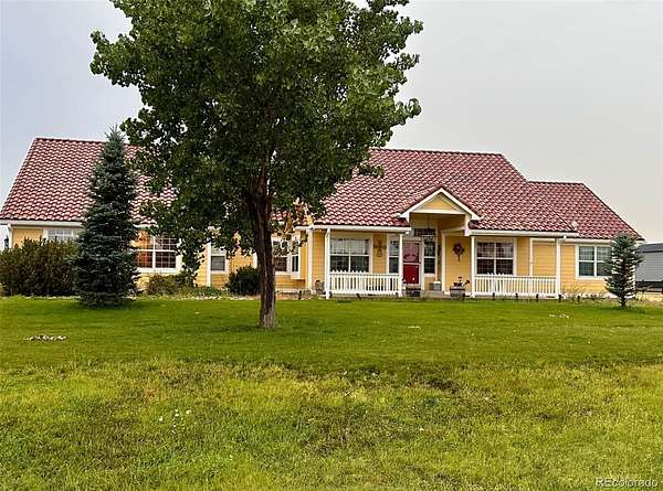 2.6 Acres of Land with Home for Sale in Strasburg, Colorado