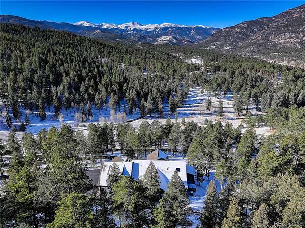 10.1 Acres of Land with Home for Sale in Evergreen, Colorado
