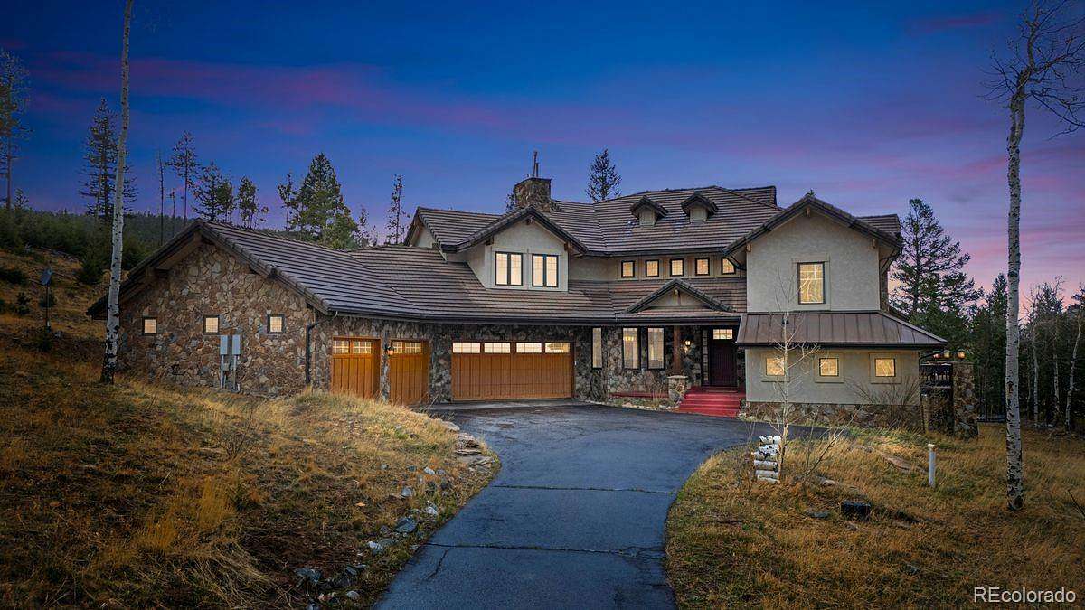 2.5 Acres of Land with Home for Sale in Evergreen, Colorado