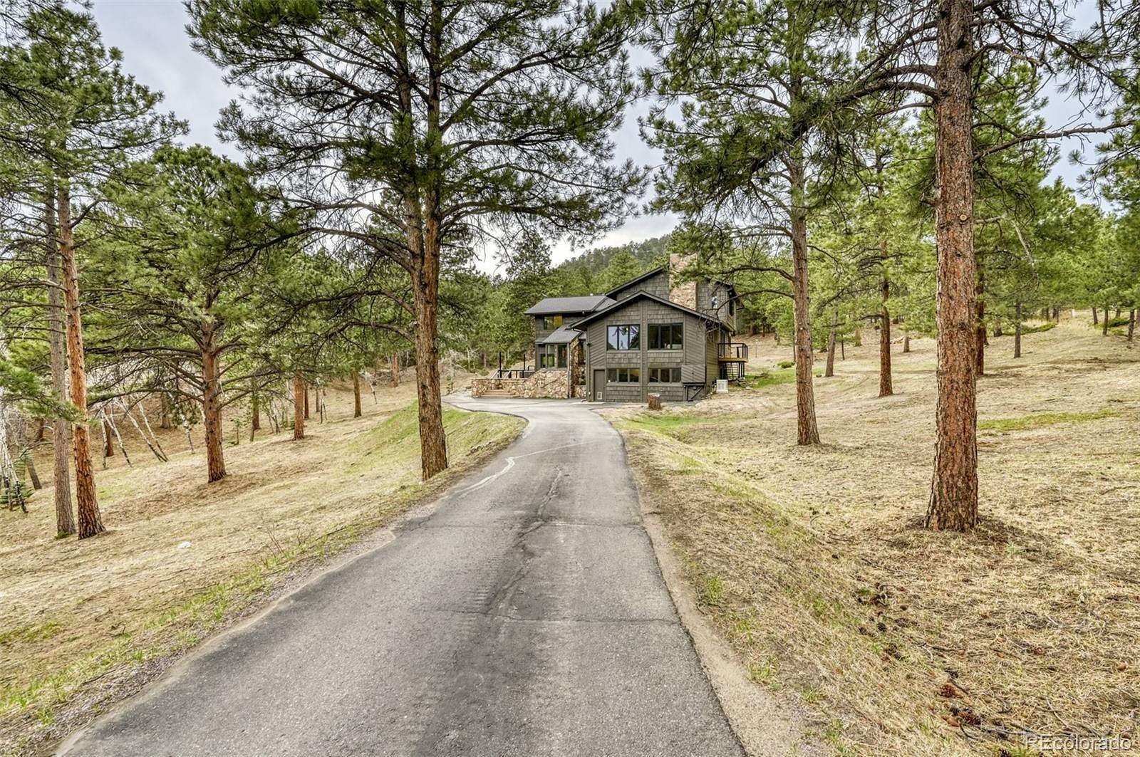5 Acres of Land with Home for Sale in Evergreen, Colorado
