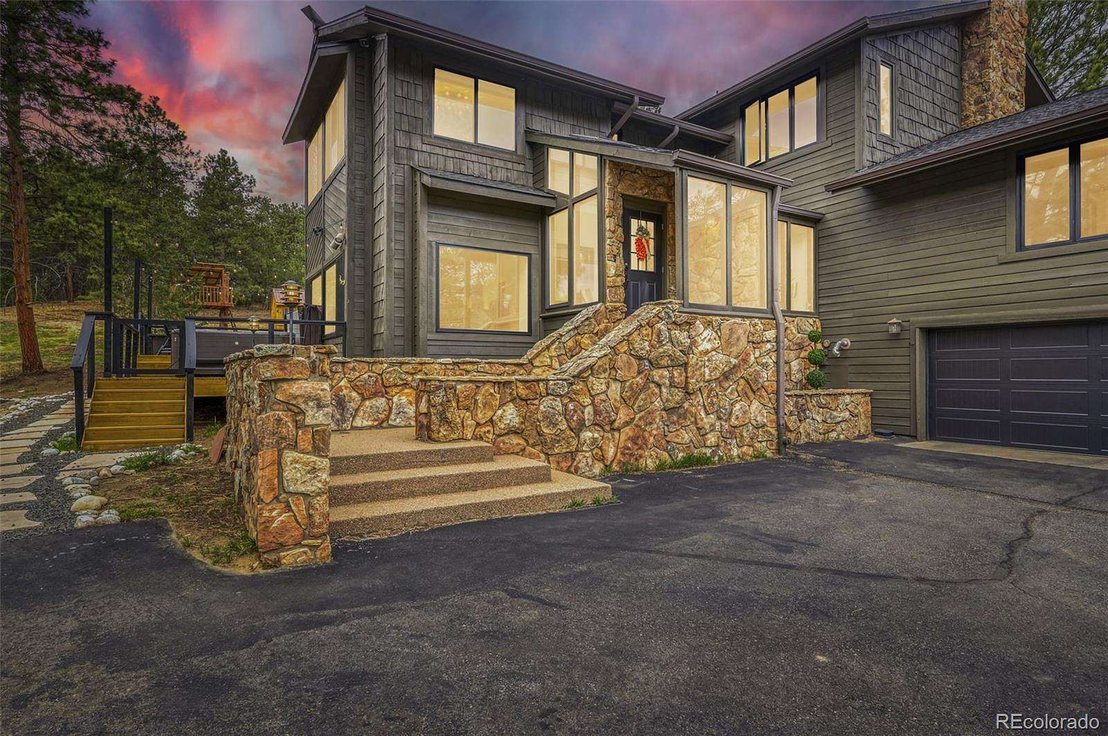 5 Acres of Land with Home for Sale in Evergreen, Colorado