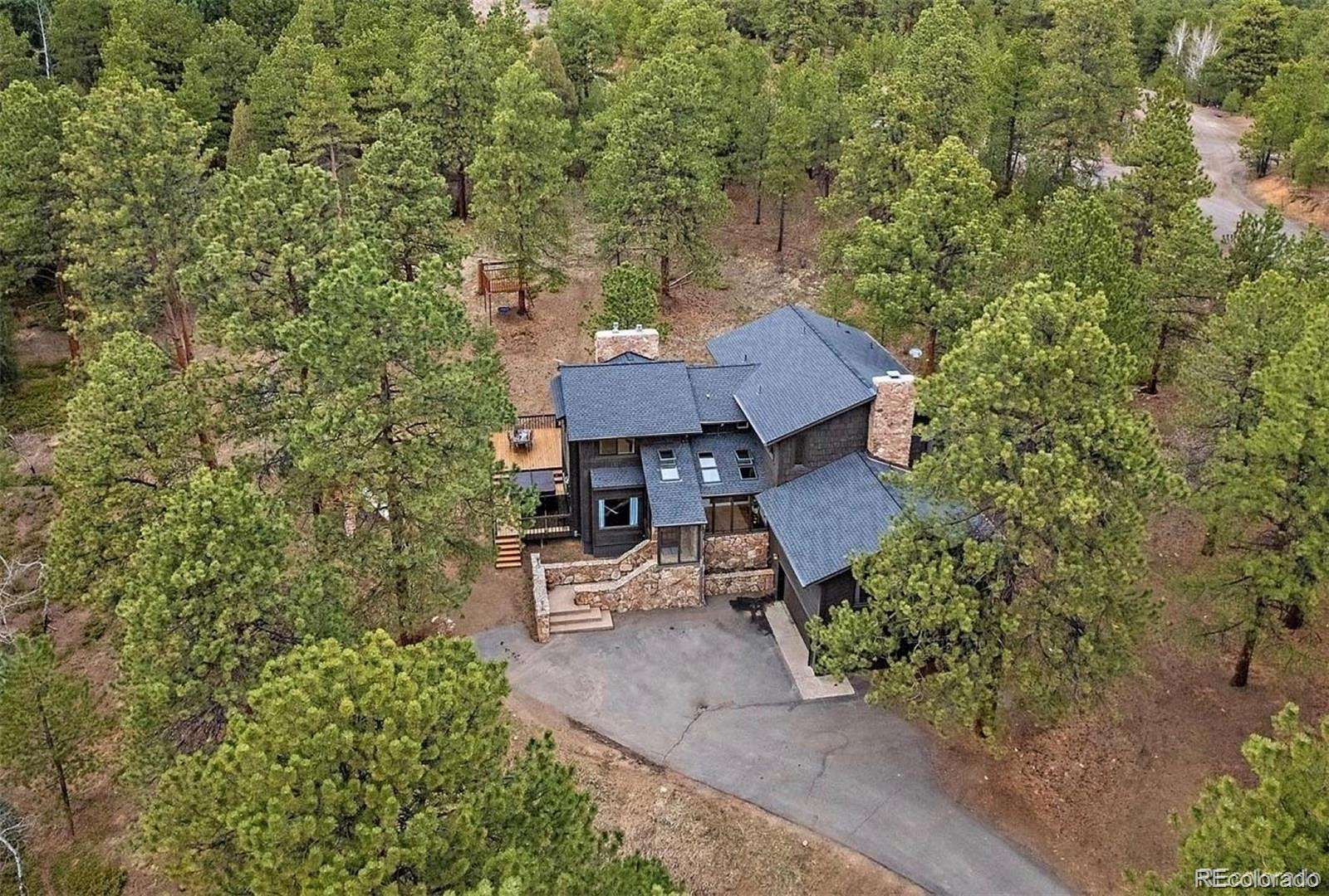 5 Acres of Land with Home for Sale in Evergreen, Colorado