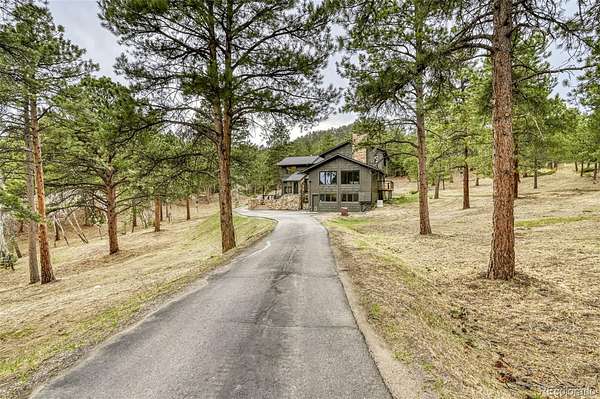 5 Acres of Land with Home for Sale in Evergreen, Colorado