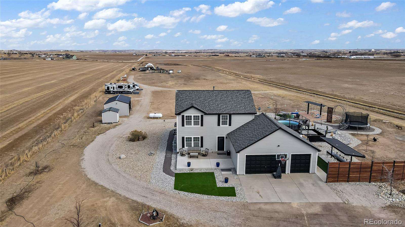 6.59 Acres of Land with Home for Sale in Brighton, Colorado